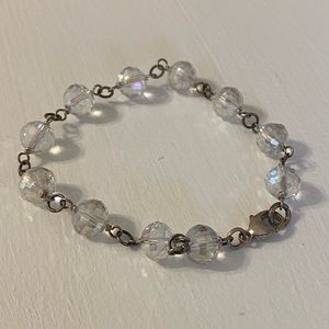 Clear plastic bead and silver bracelet